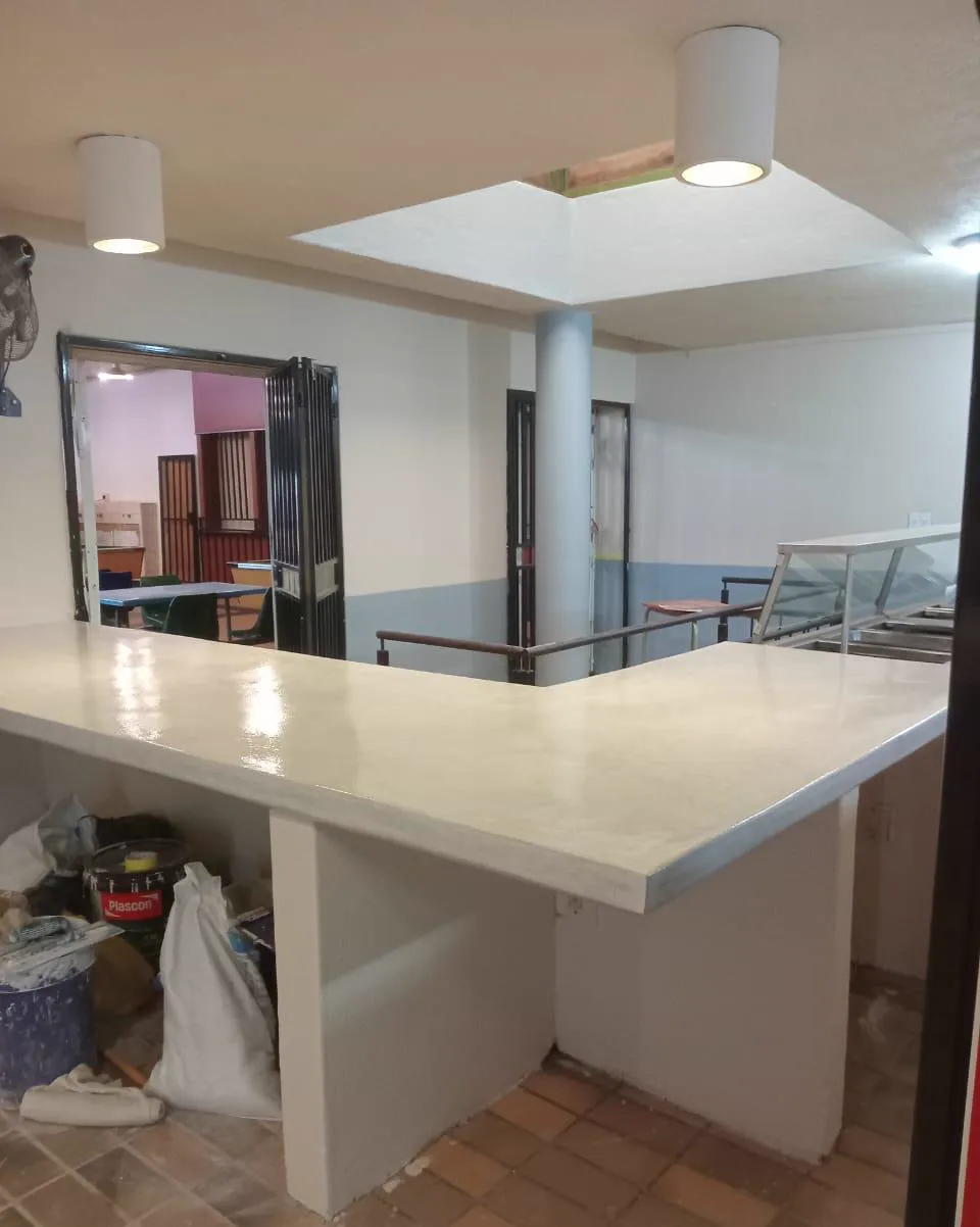Plastered commercial serving counter finished in a school canteen